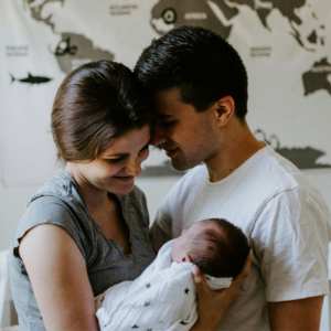 young couple with baby